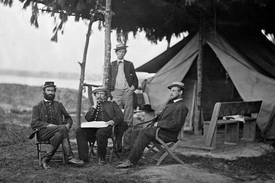 Matthew Harrison Bradley sitting with other man