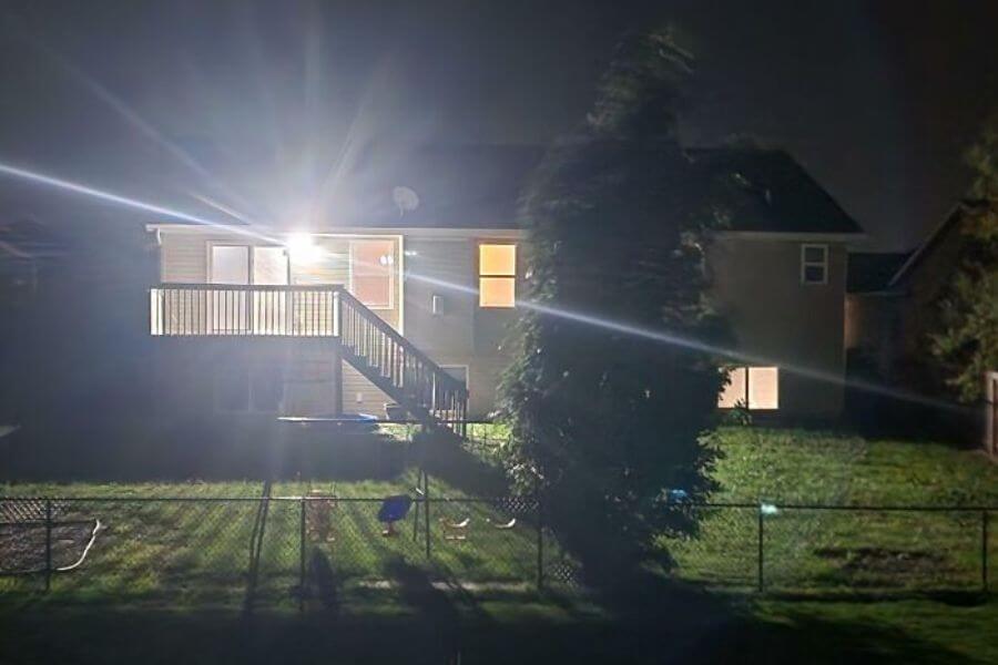 house with lights of the porch on